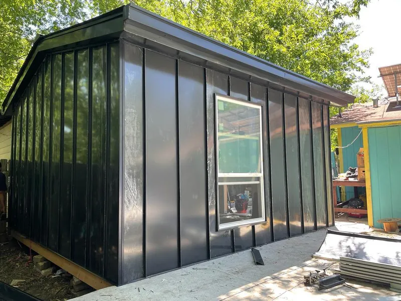 Black standing seam metal wall panels for Metal Roof Installation in Gloucester