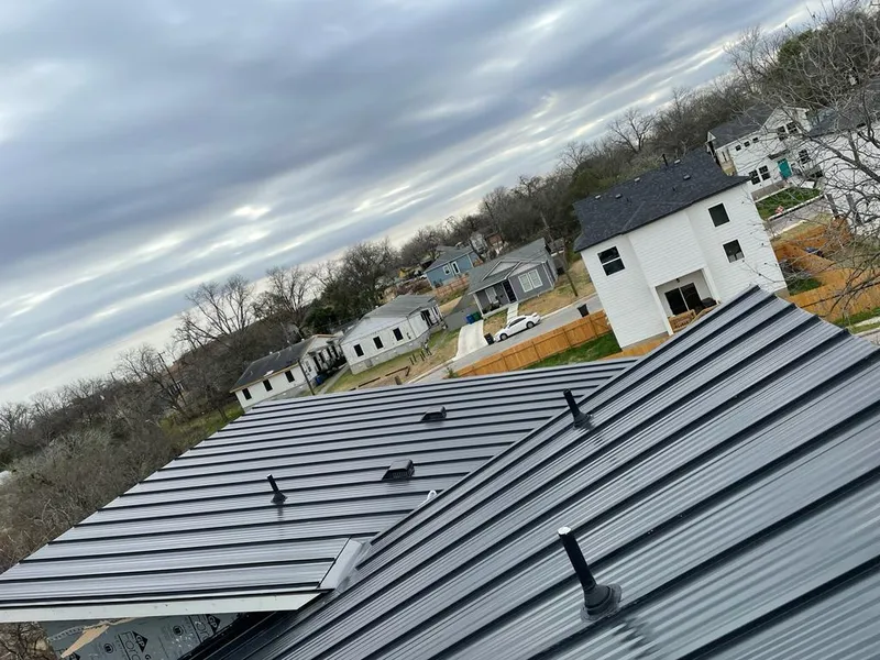 Standing seam metal roof panels with vents for Skylight Repair in Gloucester